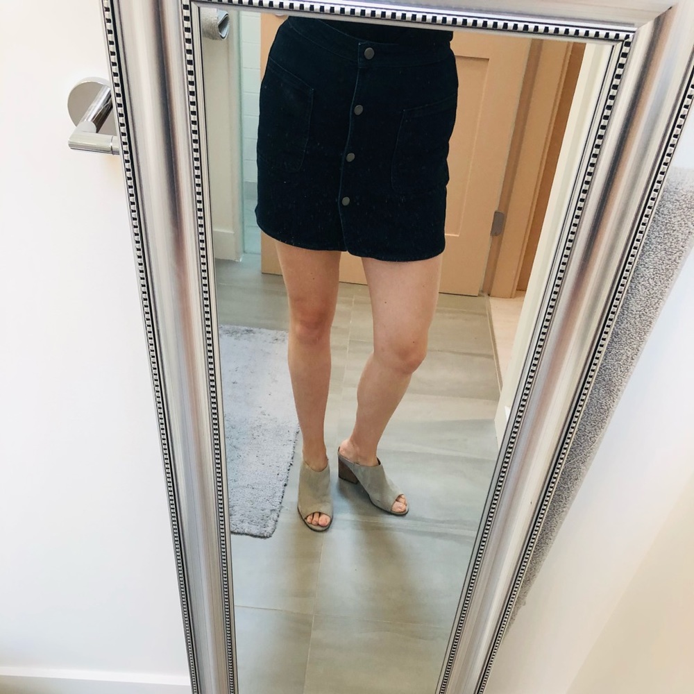 Dark denim snap front mini skirt